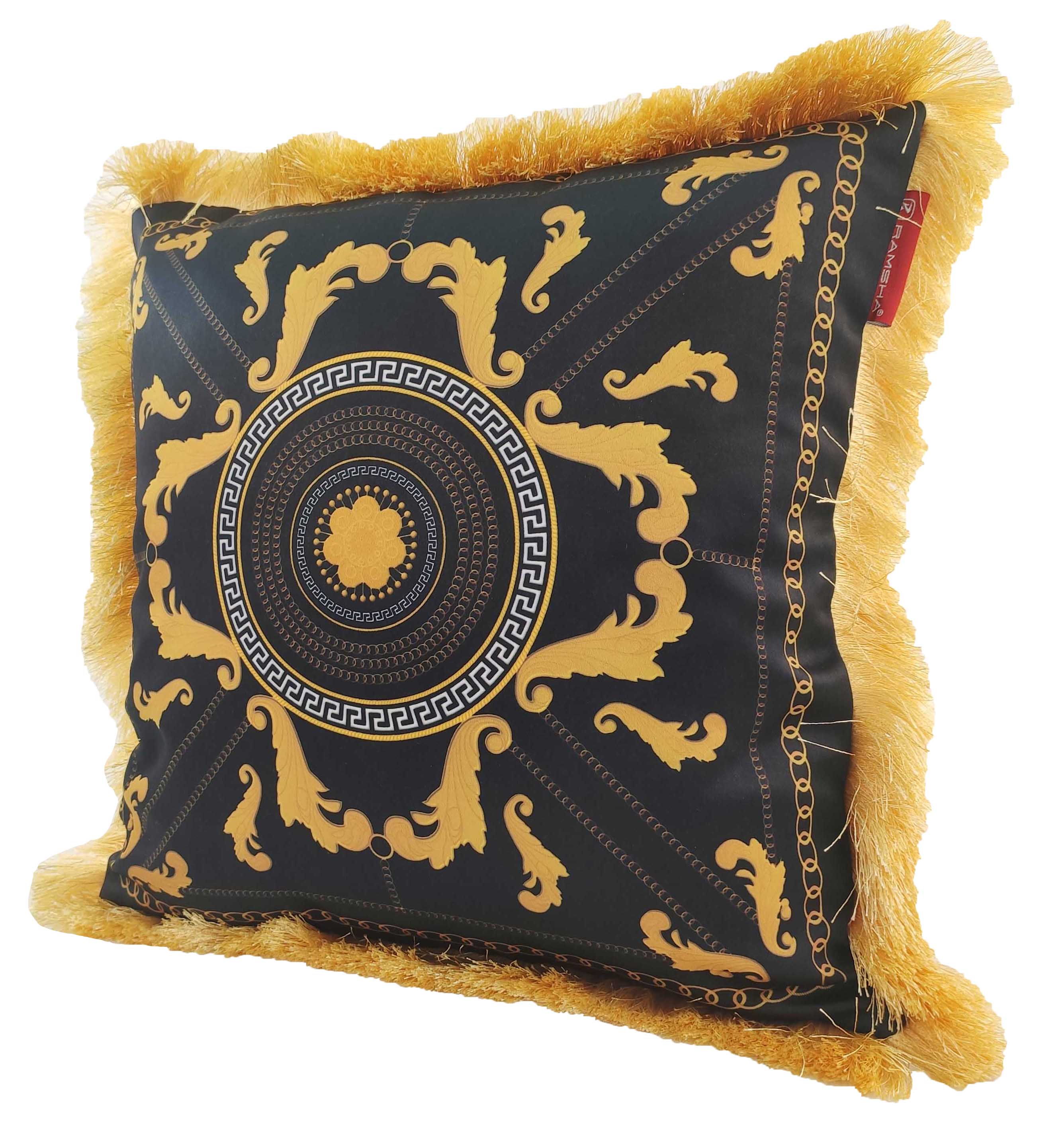 The RAMSHA HOME Polyester Cushion With Filler For Living Room CS-067 features black fabric with ornate gold baroque patterns, a central circular design, gold fringe trim, a red corner tag, and comes with filler for comfort.