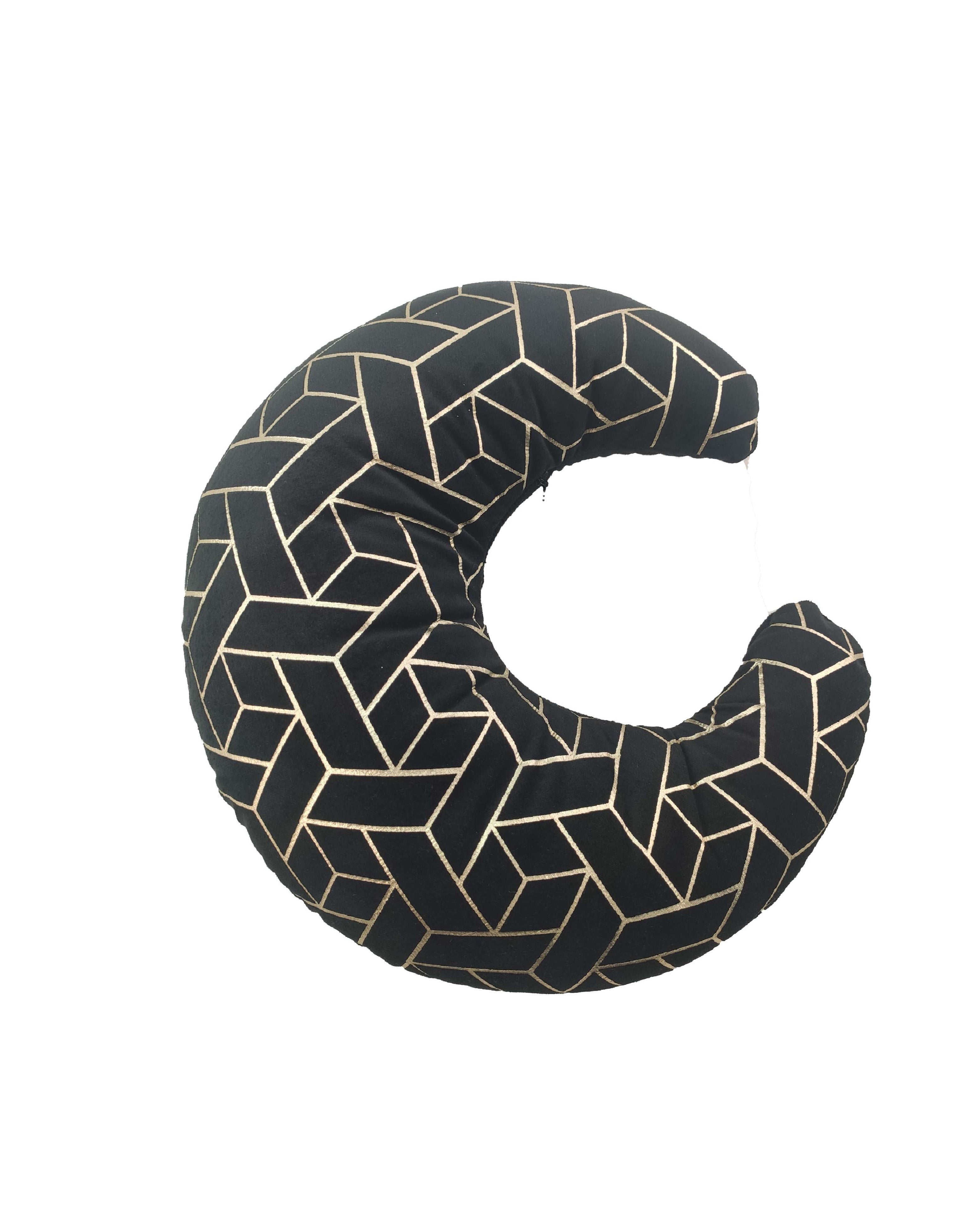 The RAMSHA HOME Velvet Moon Shape Cushion CS-110 features a crescent design in black velvet with a geometric gold line pattern, making it a stylish decor accessory for your living space. Photographed on a white background.