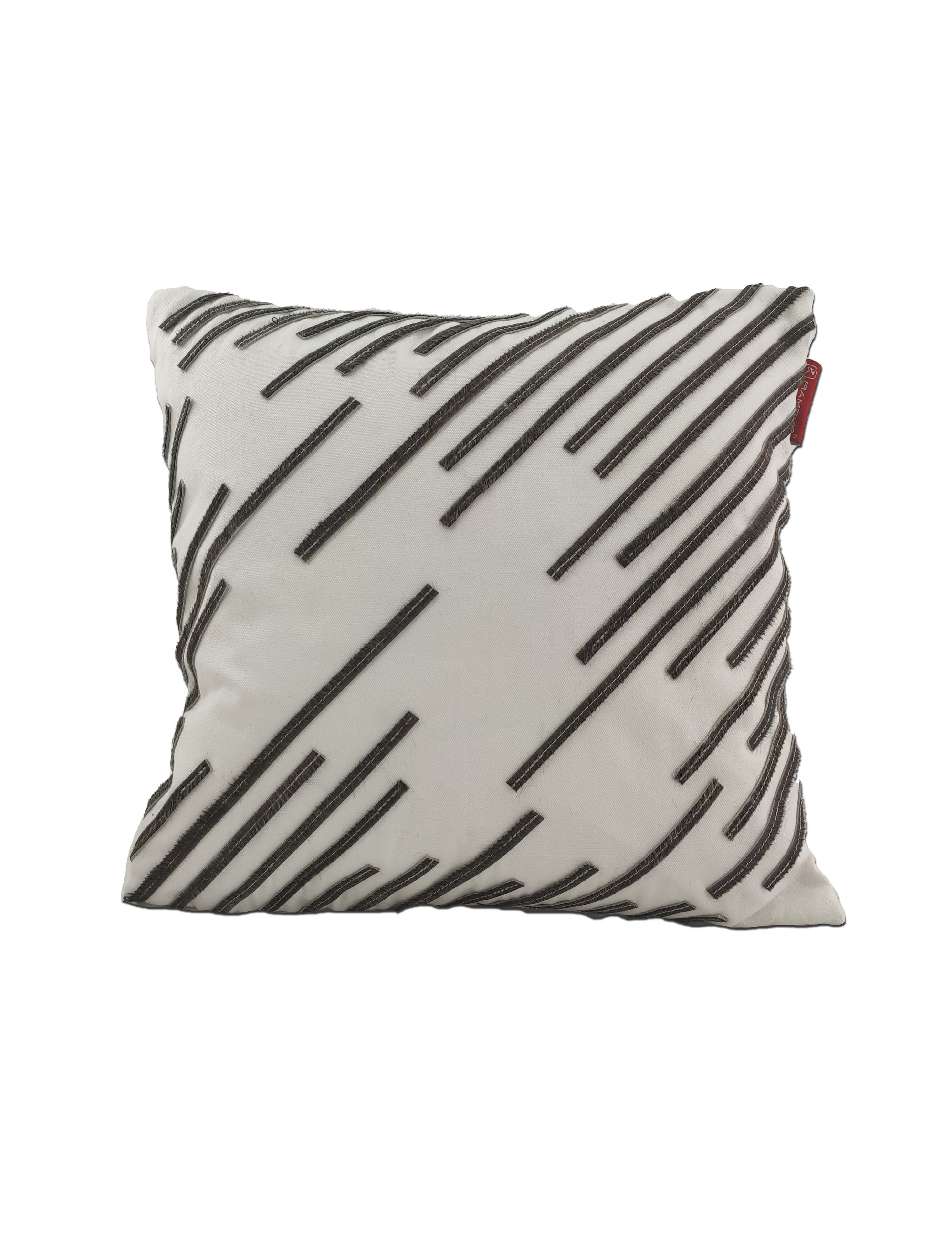 The RAMSHA HOME Leather And Polyester Cushion CS-109 is a square white cushion with diagonal black stitched lines in a modern abstract pattern and features a small red fabric tag on one side.