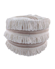 The RAMSHA HOME Cotton Boho Pouf With Fringes PF-067 is a round, beige ottoman featuring two layers of long fringe and brown stripes that brings a boho-inspired accent to your space.