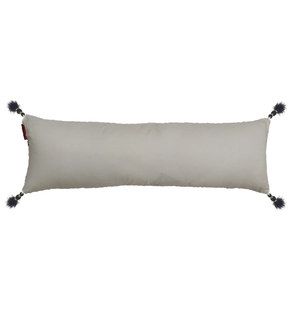 The RAMSHA HOME 100% Polyester Cushion White & Blue Color CS-137 features a long rectangular design with creamy tones, dark blue pom-poms, and gold bead accents at each corner, adding playful elegance to any space.