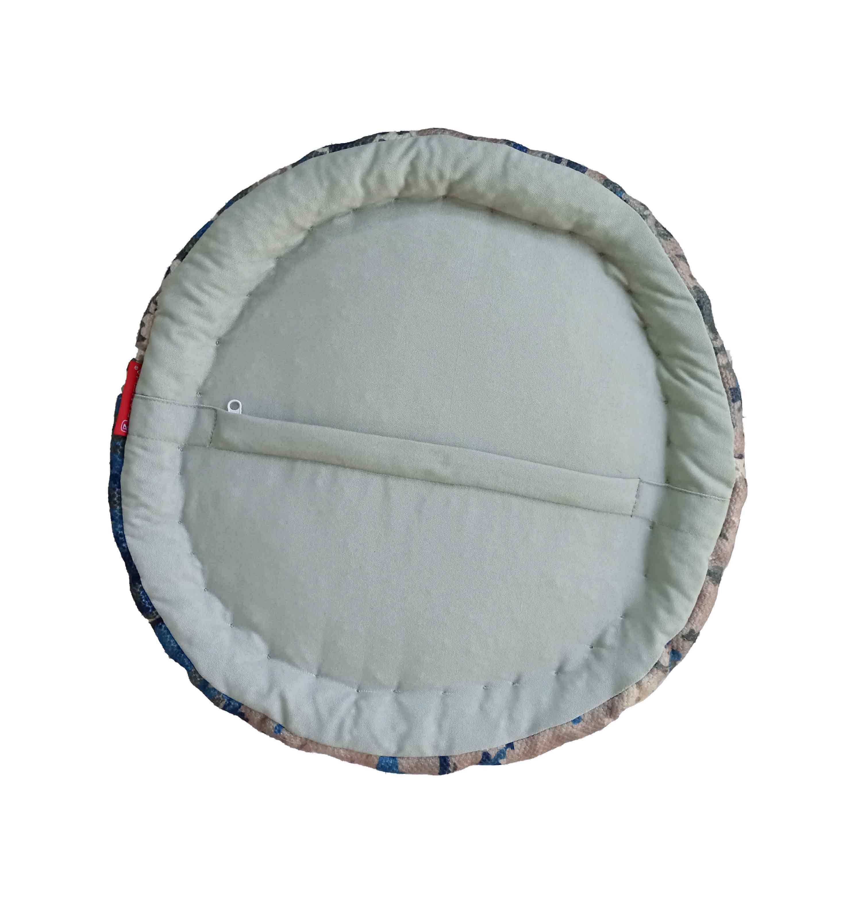 The Printed Multi Color Pouf With Leather Handle PF-030 is a round, padded pet bed with a patterned edge and light center, featuring a leather handle—ideal as stylish home decor, shown from above against a white background.