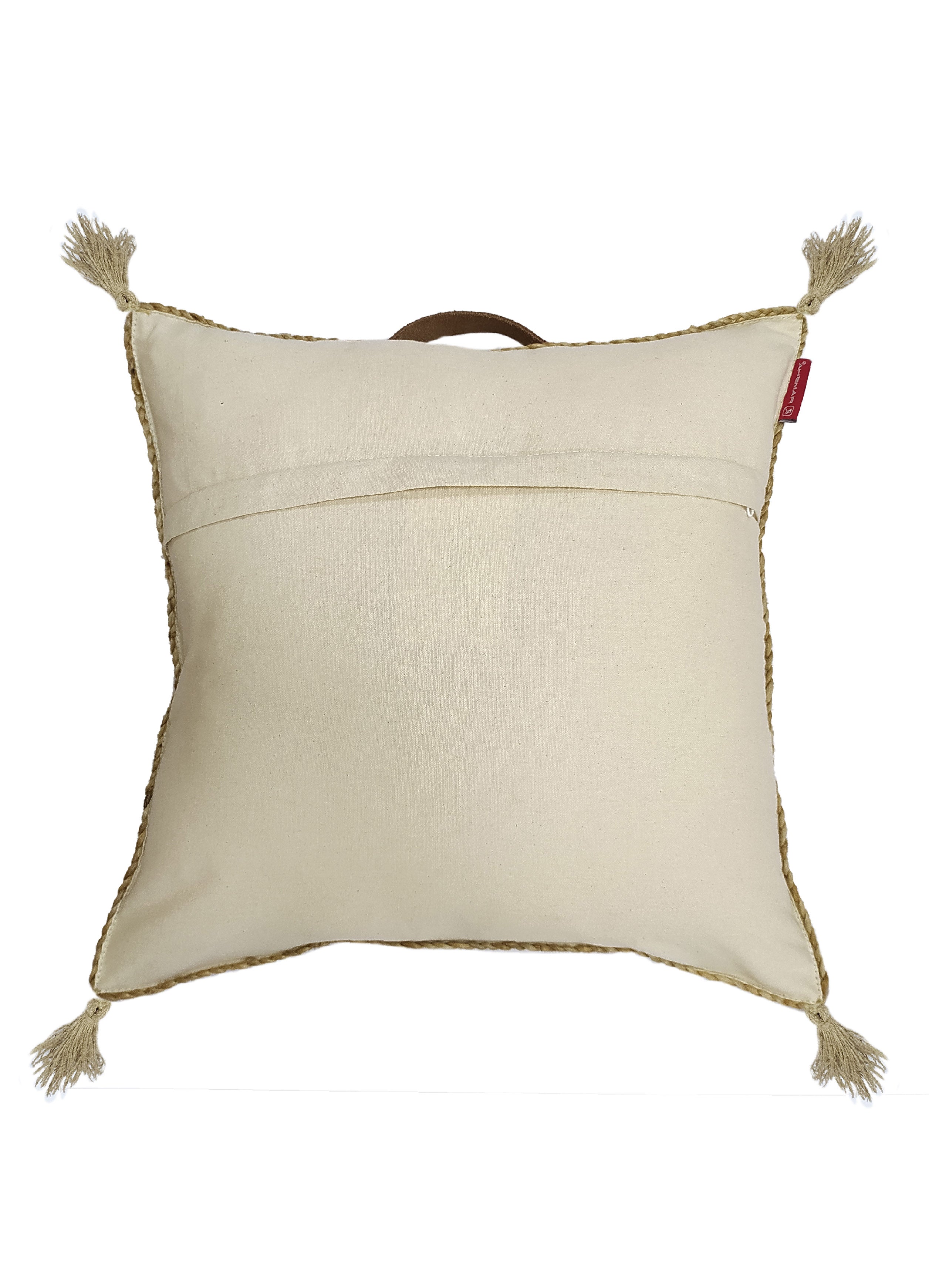 The RAMSHA HOME Jute Cushion CS-134-T is a square beige cushion with four corner tassels, decorative trim, a horizontal back opening, a top brown handle, and a red tag—ideal for modern home décor.