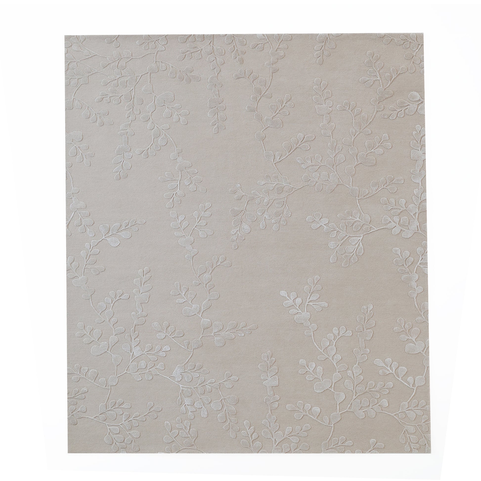 The RAMSHA HOME Artisan Handmade Decorative Area Rug – HTWV-116 is a rectangular beige rug featuring a subtle raised botanical pattern of branches and leaves for a textured, elegant look.