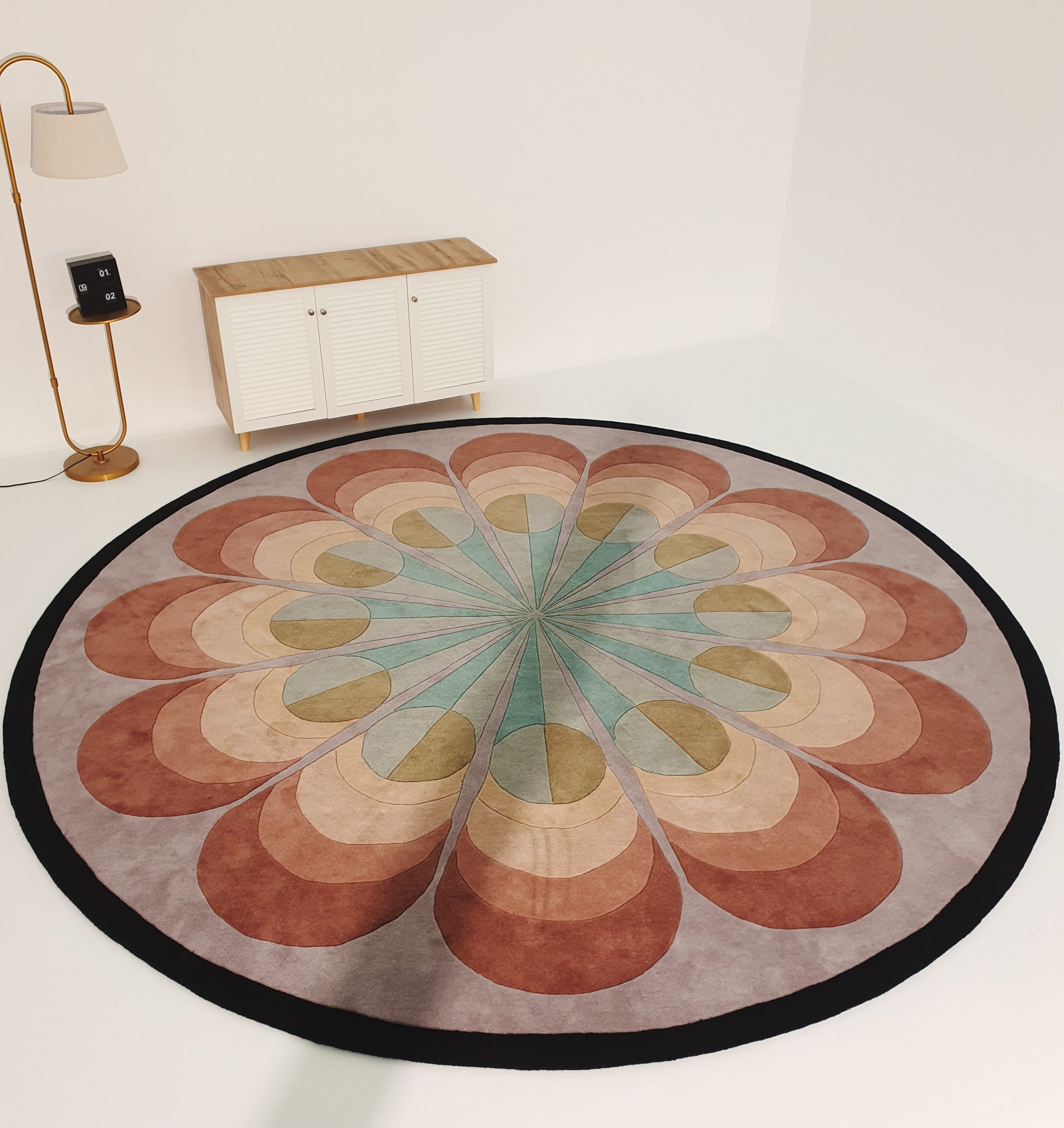 The RAMSHA HOME Handmade Carpet for Bedroom Decor – HTW-54 features a retro geometric flower pattern in pastel green, peach, beige, and brown, perfect for modern spaces with white floors and wooden cabinets.