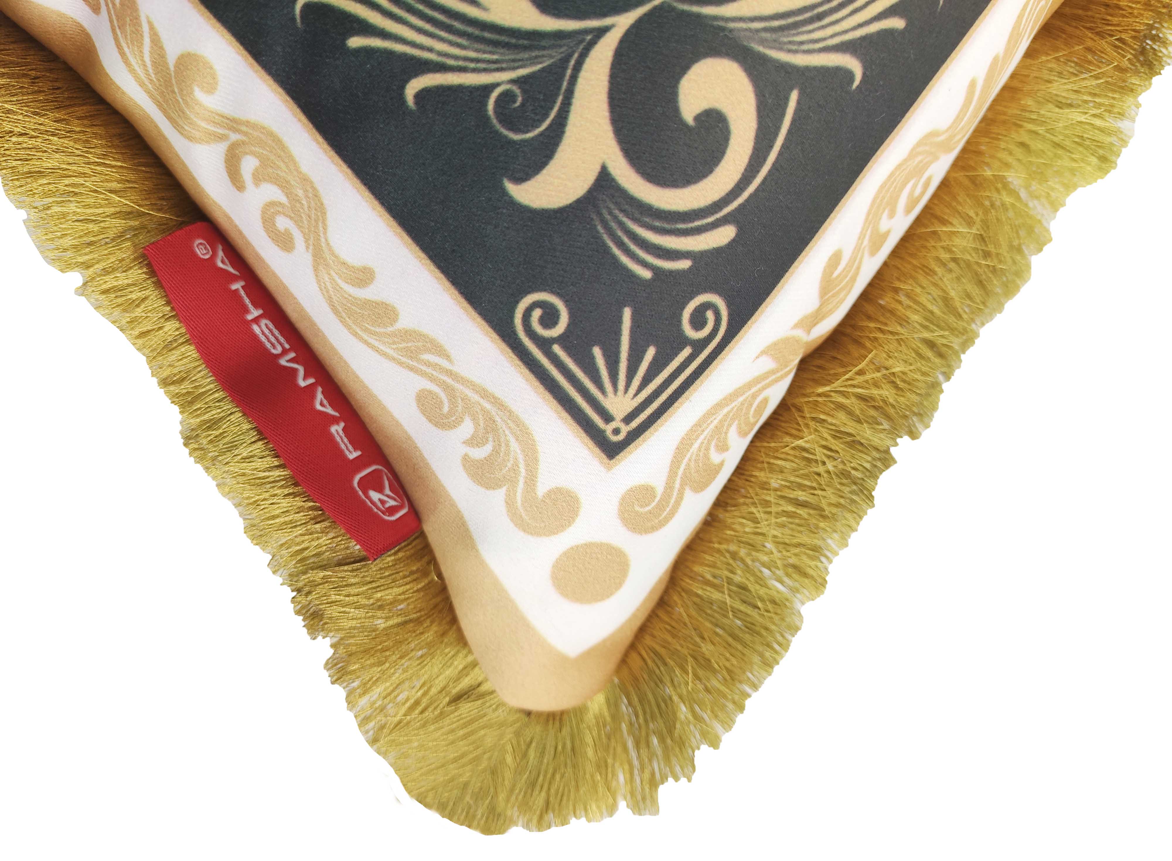 Close-up of the Digital Printed Cushion With Filler CS-056 by RAMSHA HOME, featuring gold fringe, black and gold patterned fabric, and a red RAMSHA tag.