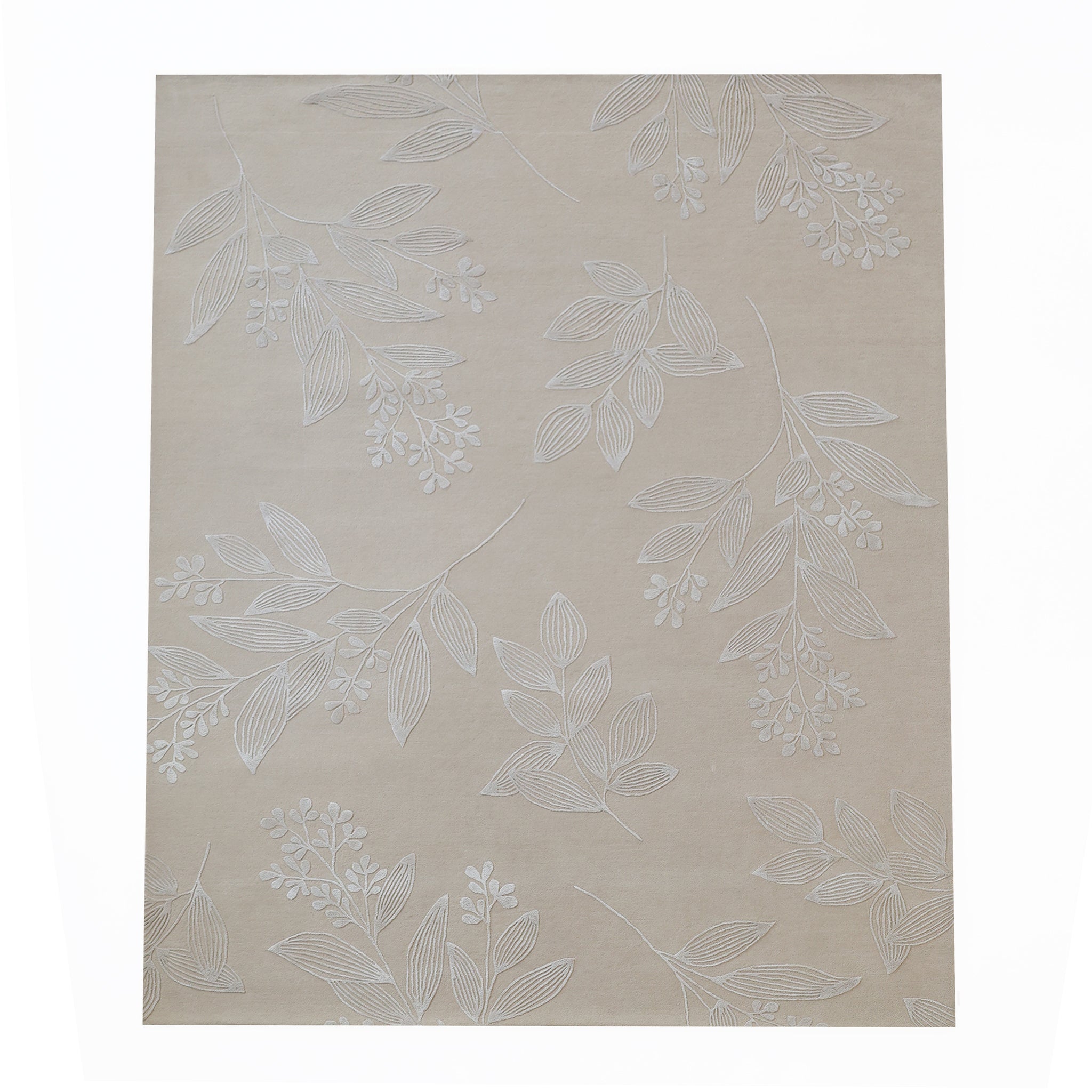 The RAMSHA HOME Natural Beige & Ivory Handmade Area Rug (HTWV-146) features a subtle white leaf and small flower cluster pattern scattered across its beige wool surface.