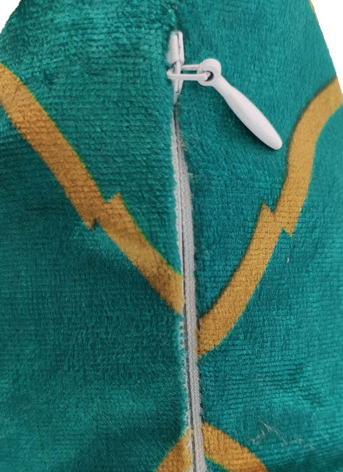 Close-up of the RAMSHA HOME Polyester Cushion Cover in teal, featuring yellow zigzag patterns and a white center zipper. Durable, easy to clean, and stylish.