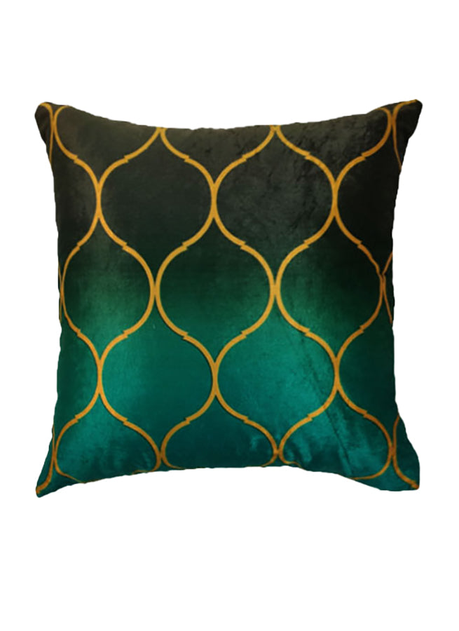 The RAMSHA HOME Polyester Cushion Cover is a square, velvet pillow in dark green with a shiny finish, featuring a gold interlocking geometric lattice and a gradient background that fades from black to green.
