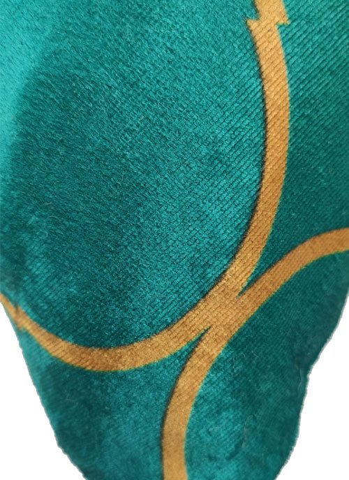 Close-up of the RAMSHA HOME Polyester Cushion Cover in teal, showcasing a soft texture with golden intersecting curved lines. Durable and easy to clean, this cover is ideal for everyday use.