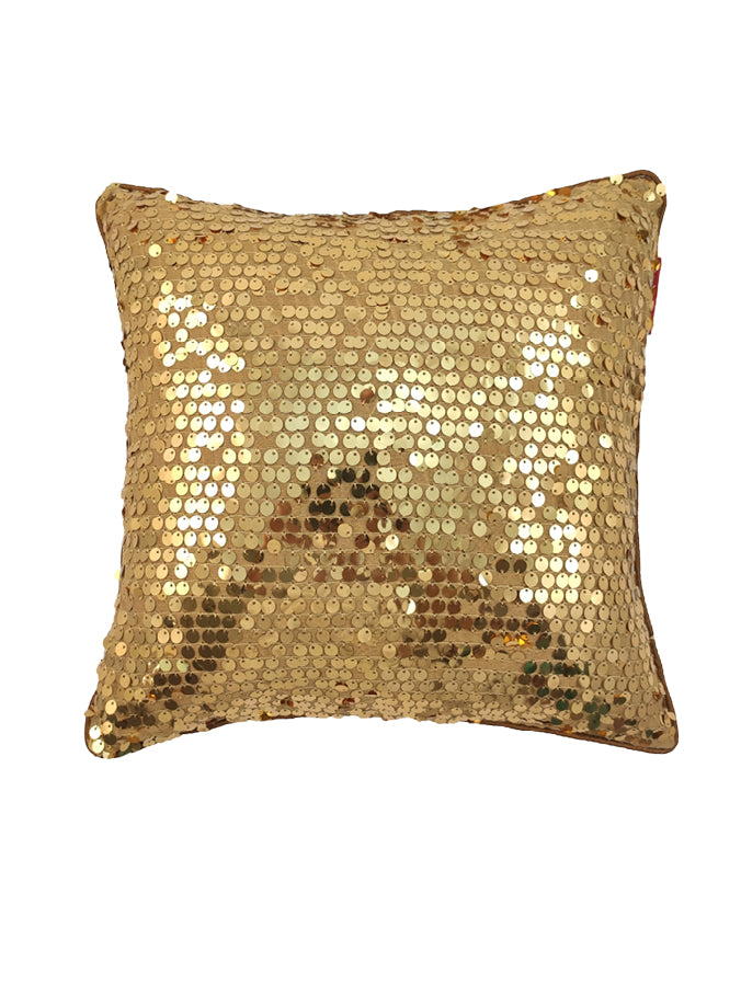 The RAMSHA HOME Polyester Sequine Cushion Cover features a shiny gold, sparkling surface, perfect for bringing a touch of glamour to your living room decor against a plain white background.