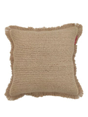 The Natural Color Jute & Cotton Cushion With Filler CS-030 by RAMSHA HOME features a square beige design with a textured woven surface, fringed edges, and a small red fabric tag for added charm. Seen from above against a white background.