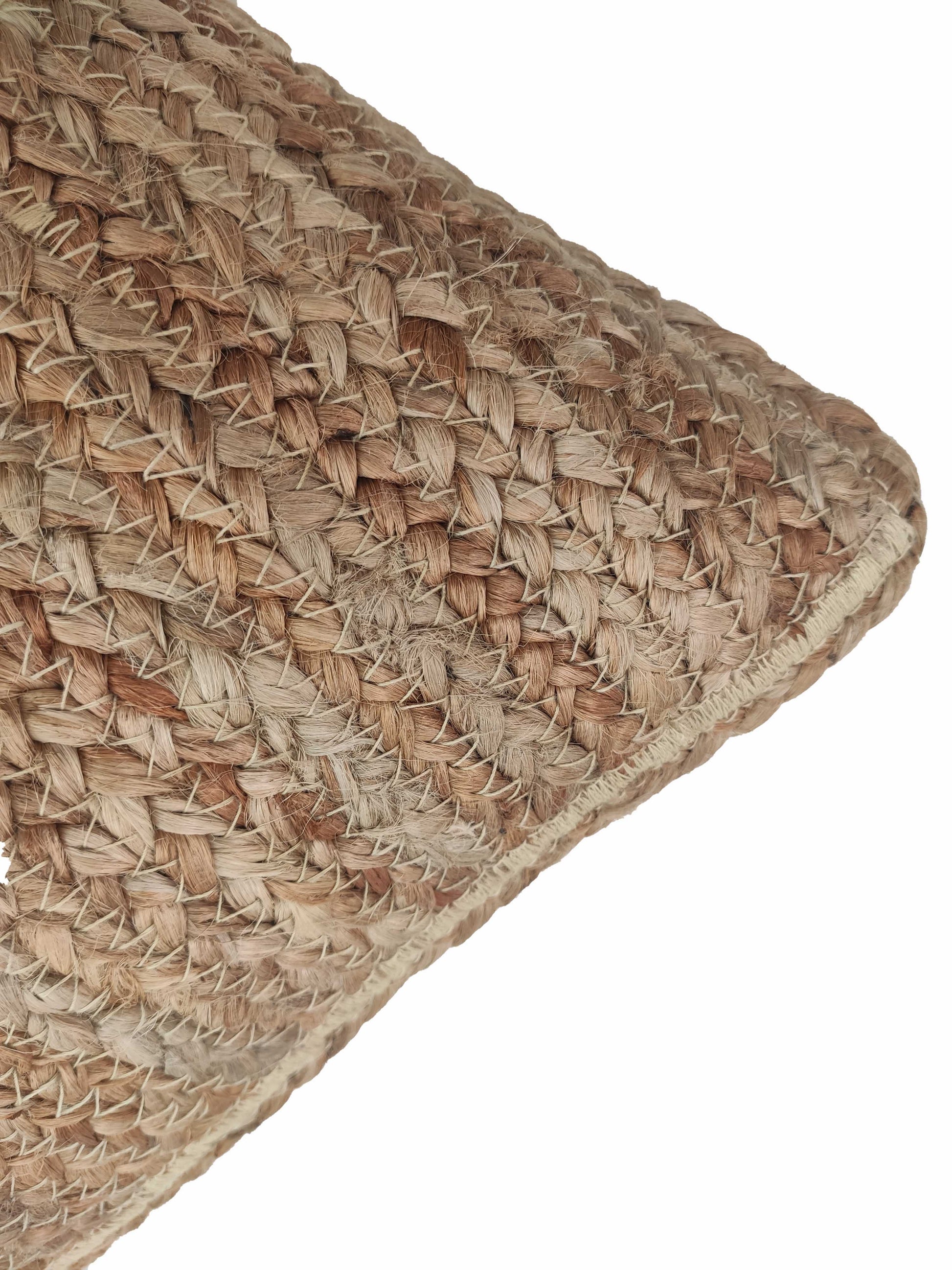Close-up of the Jute Cushion With Filler CS-032 by RAMSHA HOME, highlighting its detailed interlaced jute pattern in brown and beige tones against a white background.