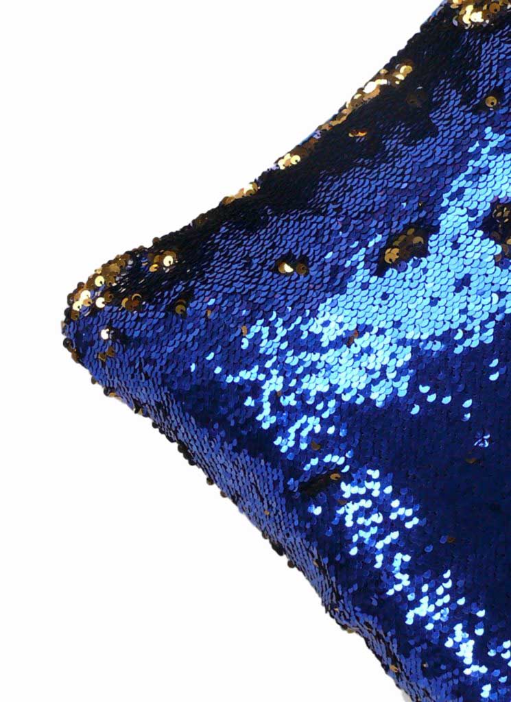 Close-up of a RAMSHA HOME Home Decor Cushion Cover featuring shiny, reversible blue sequins with gold accents—ideal for adding a playful or elegant touch to your living room and enhancing your home decor.