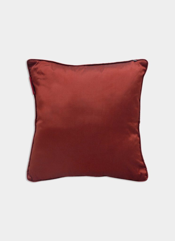 The RAMSHA HOME Home Decor Cushion Cover features a square, rust-colored satin design with a smooth finish and slightly rounded corners, ideal for enhancing your living room style. Shown on a plain white background.