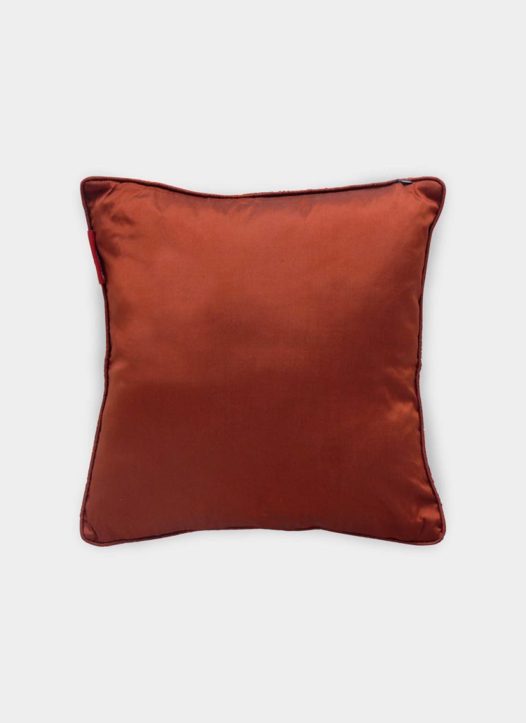 The RAMSHA HOME Home Decor Cushion Cover features a square design in rust color with a smooth, shiny fabric—ideal for elevating your living room style. Shown on a plain white background.