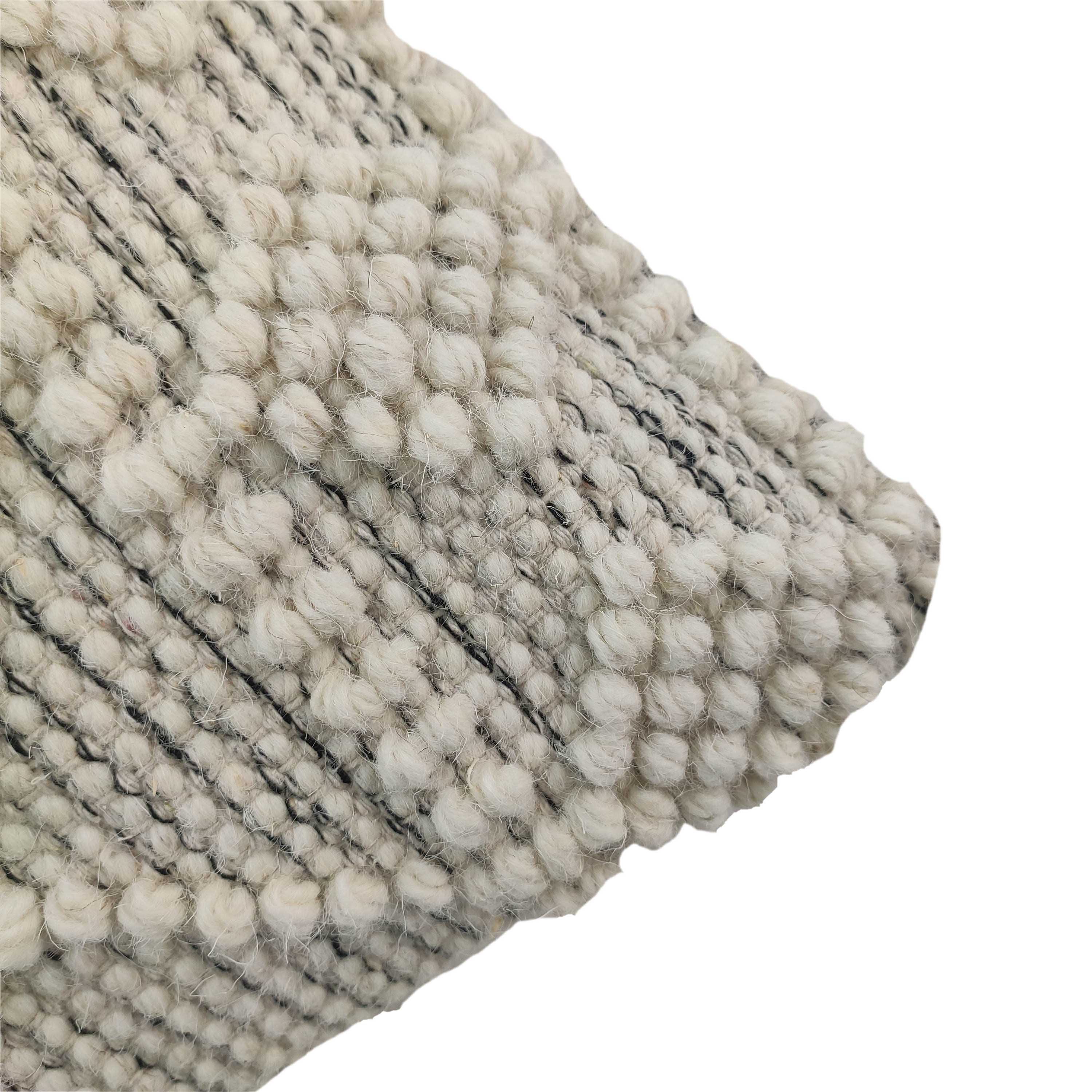 Close-up of the Natural & Black Color Cushion With Filler CS-047 by RAMSHA HOME, showing its cream textured knit and raised bobble pattern—an ideal modern accent for any room.