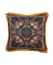 The RAMSHA HOME Multi Color Printed Cushion With Filler CS-052 features a square shape, vibrant paisley and floral patterns on a dark background, gold fringes, and adds a bohemian or vintage flair to your decor.