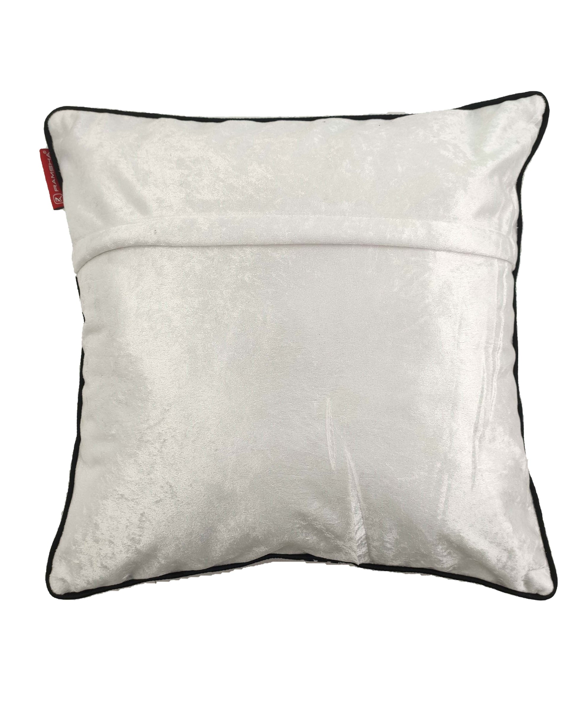 The RAMSHA HOME Cushion Cover Black & White Color CS-074 is a square white velvet cover with black piping, a subtle sheen, horizontal back seam, and a small red tag for a stylish home décor accent.