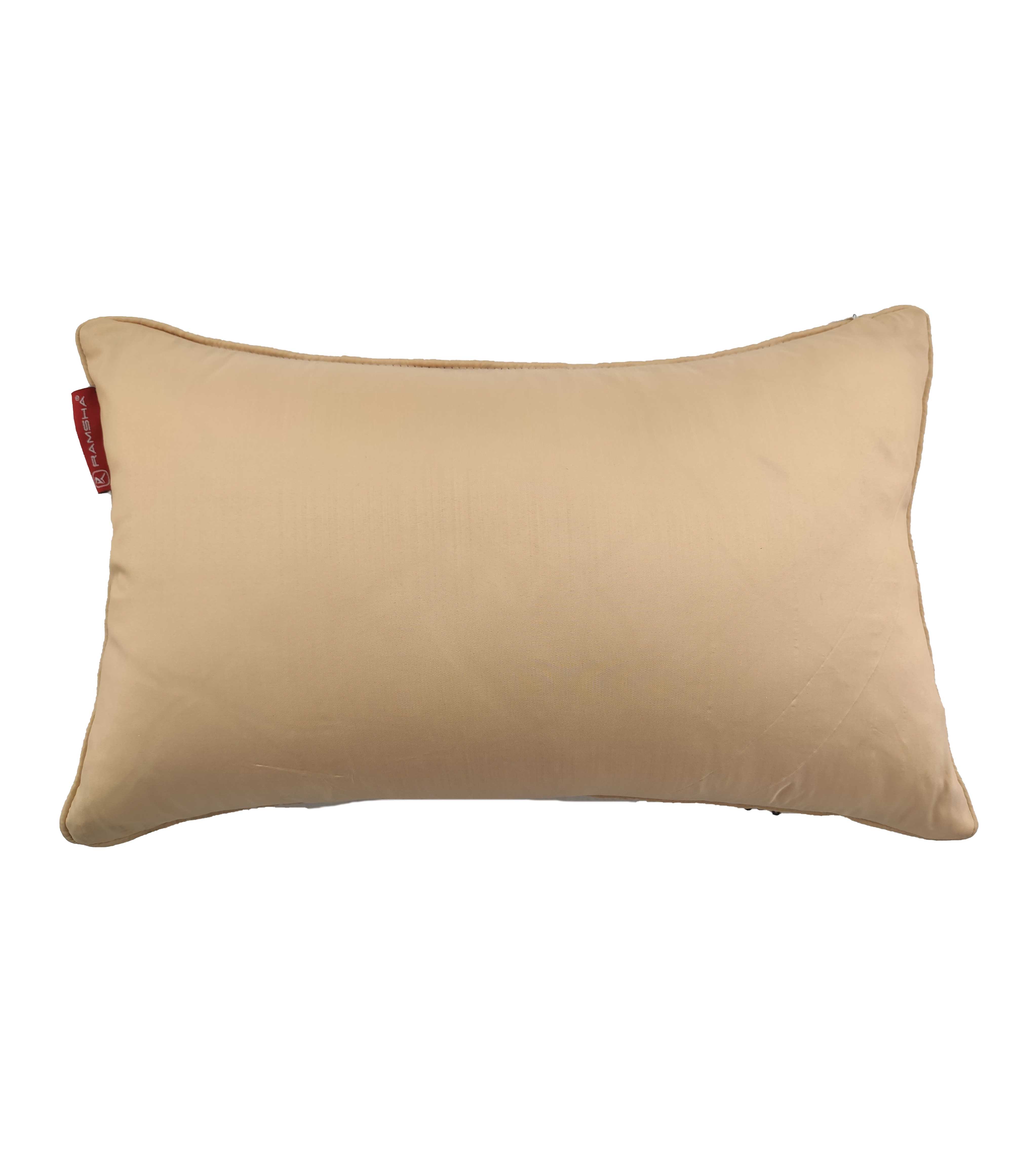 The RAMSHA HOME Polyester Sequence Cushion With Filler features a rectangular beige design with a smooth surface and small red tag on the left, providing comfortable support. Shown on a white background.