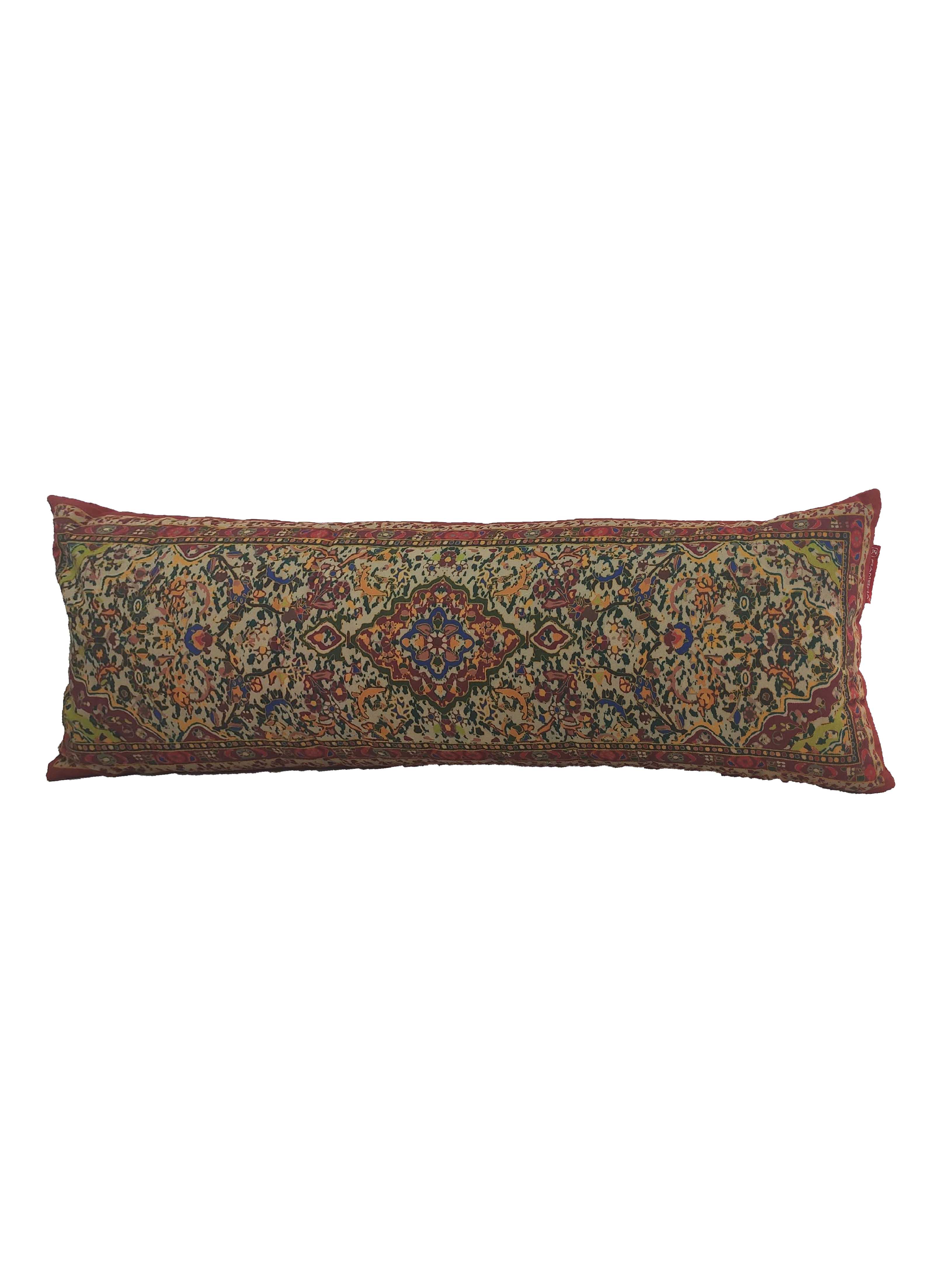 The RAMSHA HOME Multi Color Cushion With Filler CS-089 is a long, rectangular cushion with a Persian-style pattern in red, green, blue, and gold on white; includes a soft polyester filler for extra comfort.