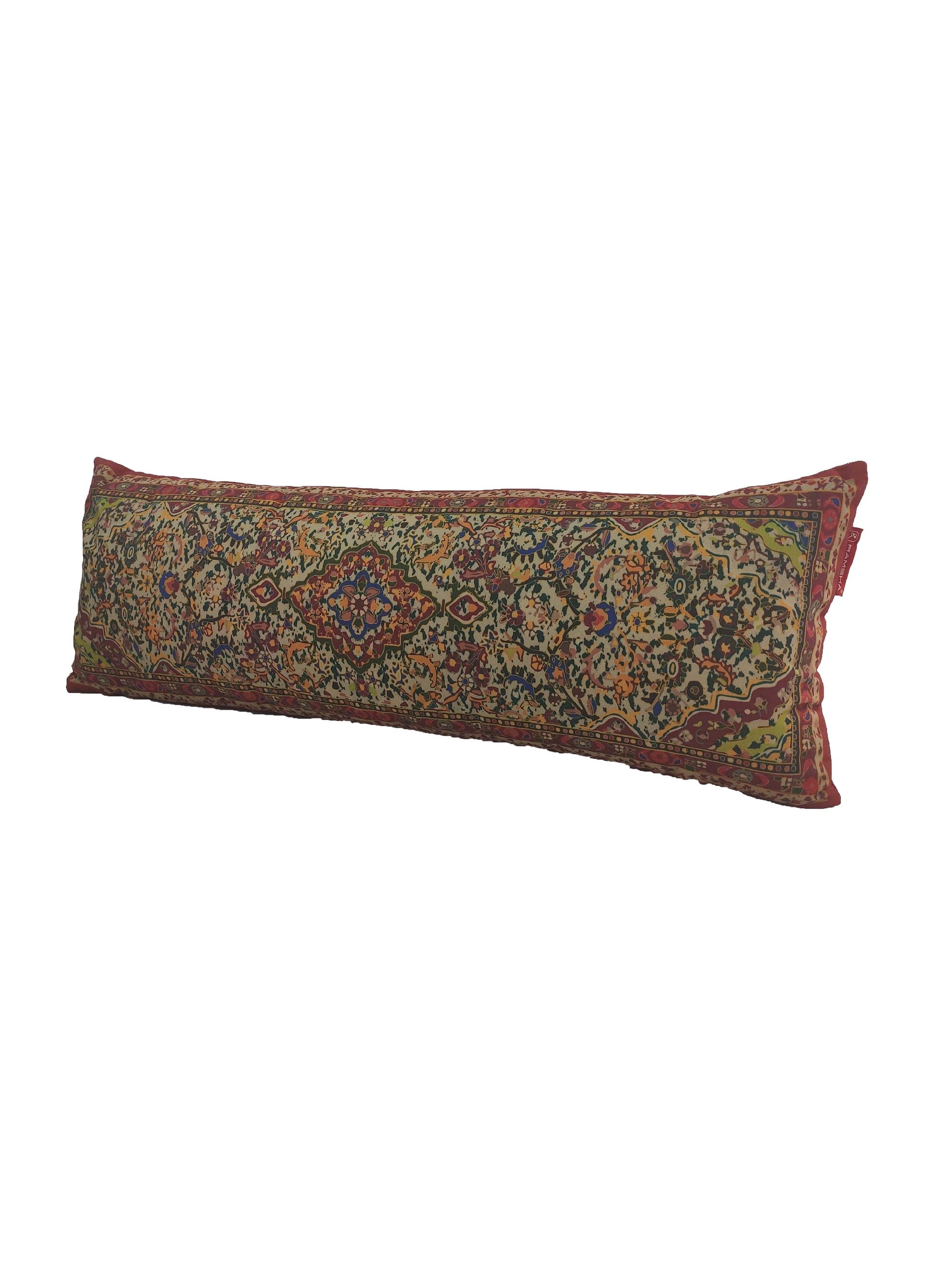 The RAMSHA HOME Multi Color Cushion With Filler CS-089 is a long, rectangular cushion featuring an intricate Persian-style pattern in red, green, blue, and yellow on a crisp white background.