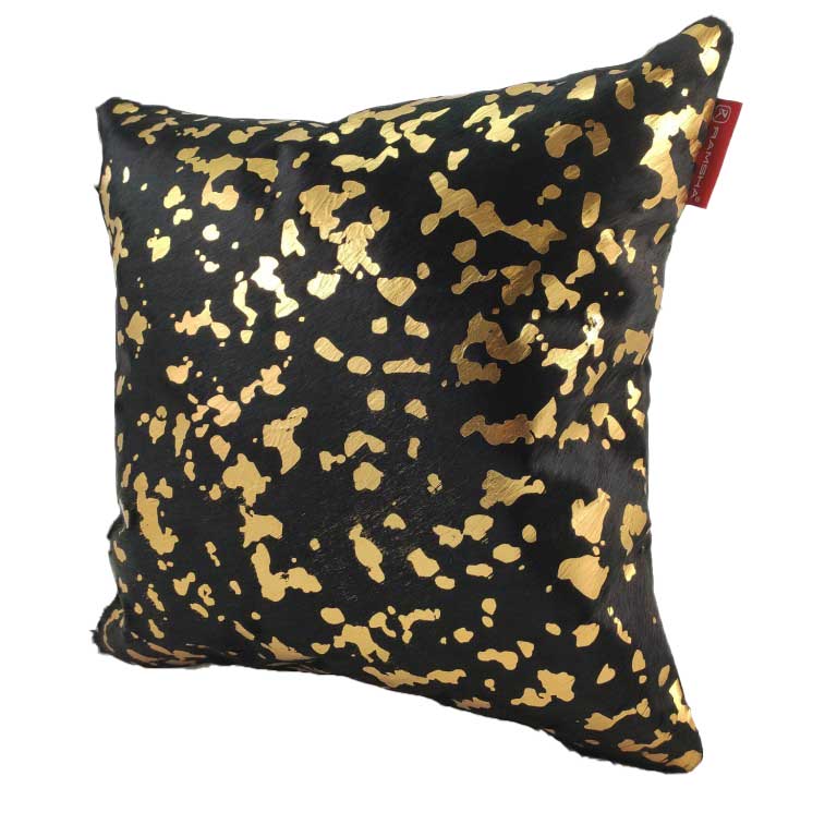 The RAMSHA HOME Decor Leather Cushion With Filler CS-092 features a black background, irregular gold metallic spots, and a red side tag—a luxurious accent pillow for any space.