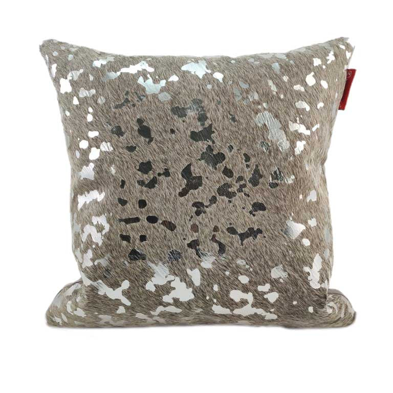 The Decor Leather Cushion With Filler CS-092 by RAMSHA HOME features textured beige fabric with irregular silver spots and a small red side tag, adding a subtle accent to this square luxury pillow.