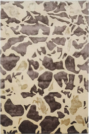 The RAMSHA HOME Handmade Multi Color Carpet HTWV-28 (202x292 CM) features irregular brown, beige, and tan shapes on a light background, evoking animal print or stone—an ideal modern designer area rug for contemporary interiors.