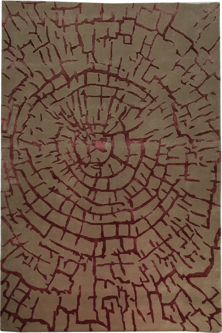 The RAMSHA HOME Abstract Tree Ring Crackle Beige & Burgundy Rug – HTWV-34 (153x245 CM) is a rectangular hand-tufted rug featuring concentric circles and irregular lines in beige and burgundy, evoking tree rings and cracks.