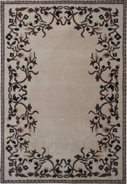 The RAMSHA HOME Traditional Home Decor Handmade Carpet – HTW-34 is a rectangular beige wool rug featuring a hand-tufted, plain center, black and brown floral vine border, and thin patterned trim along the edges.