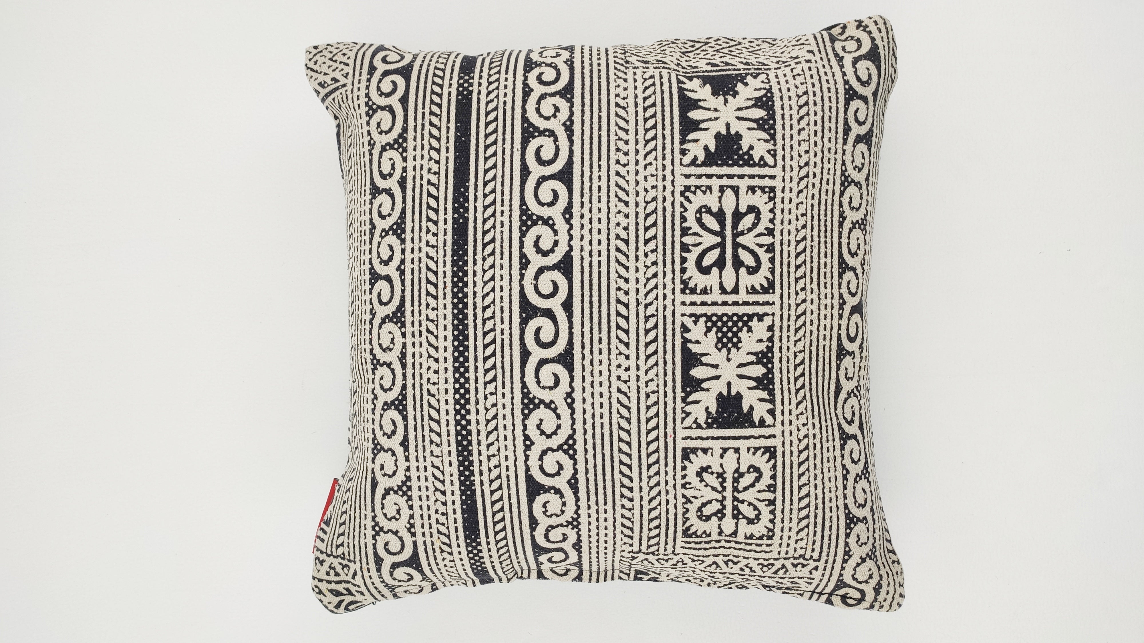 The RAMSHA HOME Polyester Geometry Cushion With Tassel cs-236 features black and white geometric and floral patterns—stripes, swirls, stylized flowers—set on a plain white background.