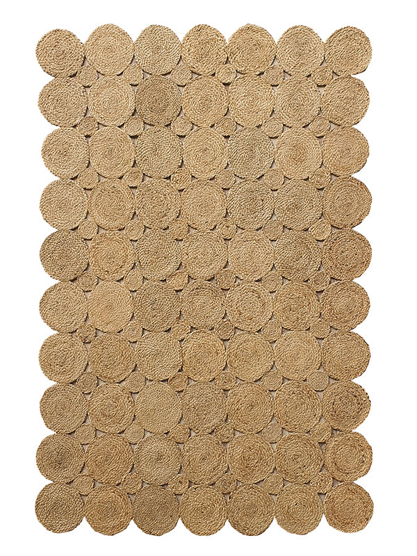 The Handmade Circular Pattern Jute Rug BR-035 by RAMSHA HOME features a textured rectangle design with overlapping circles in light brown and tan, adding an organic touch to any room.
