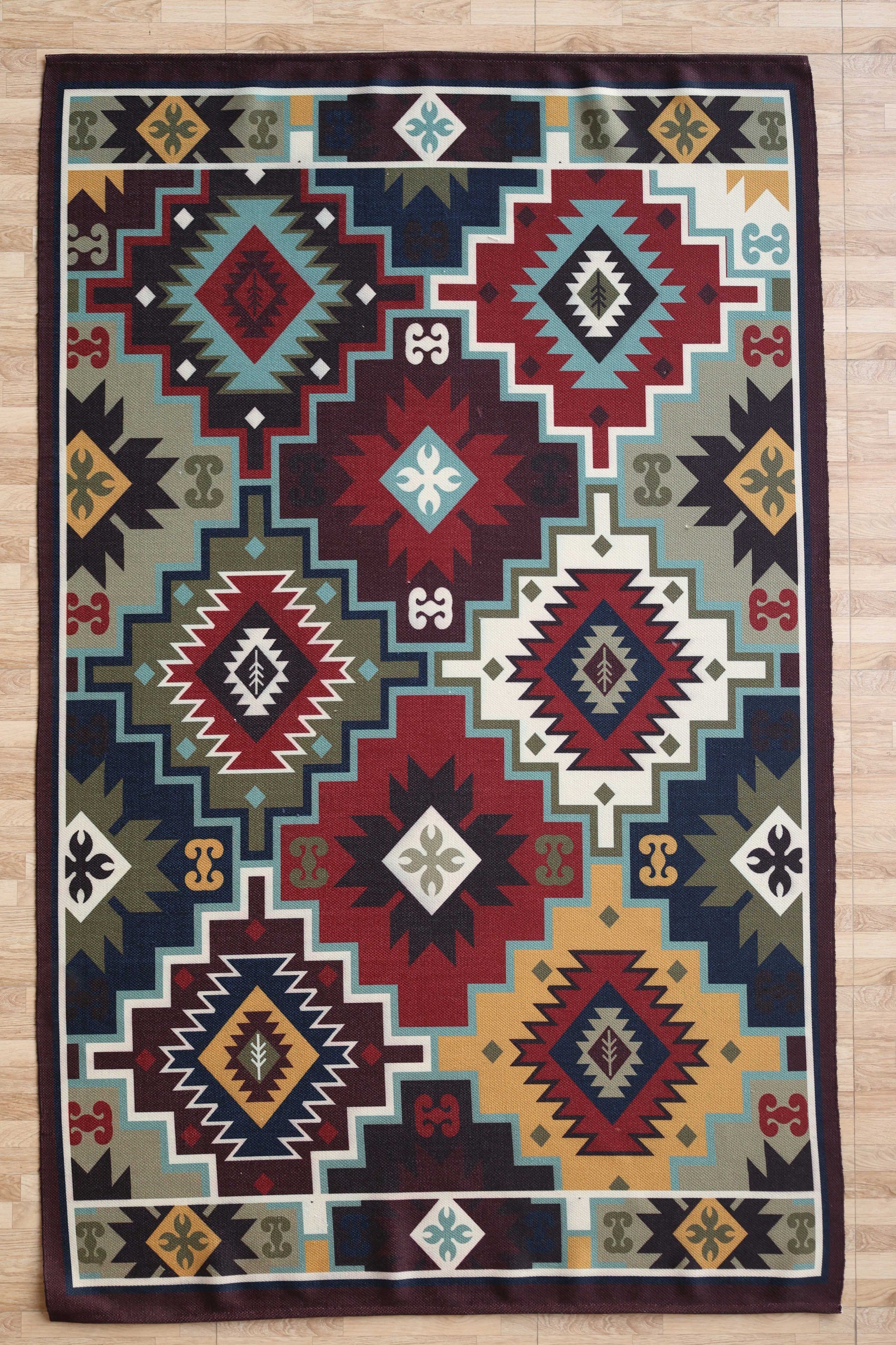The RAMSHA HOME Tribal Digital Printed Rug – Colorful Geometric Area Rug for Living Room DD-045 features bold Southwestern diamond and stepped motifs in red, black, teal, white, gold, and green, perfect for adding vibrant style to any wooden floor.