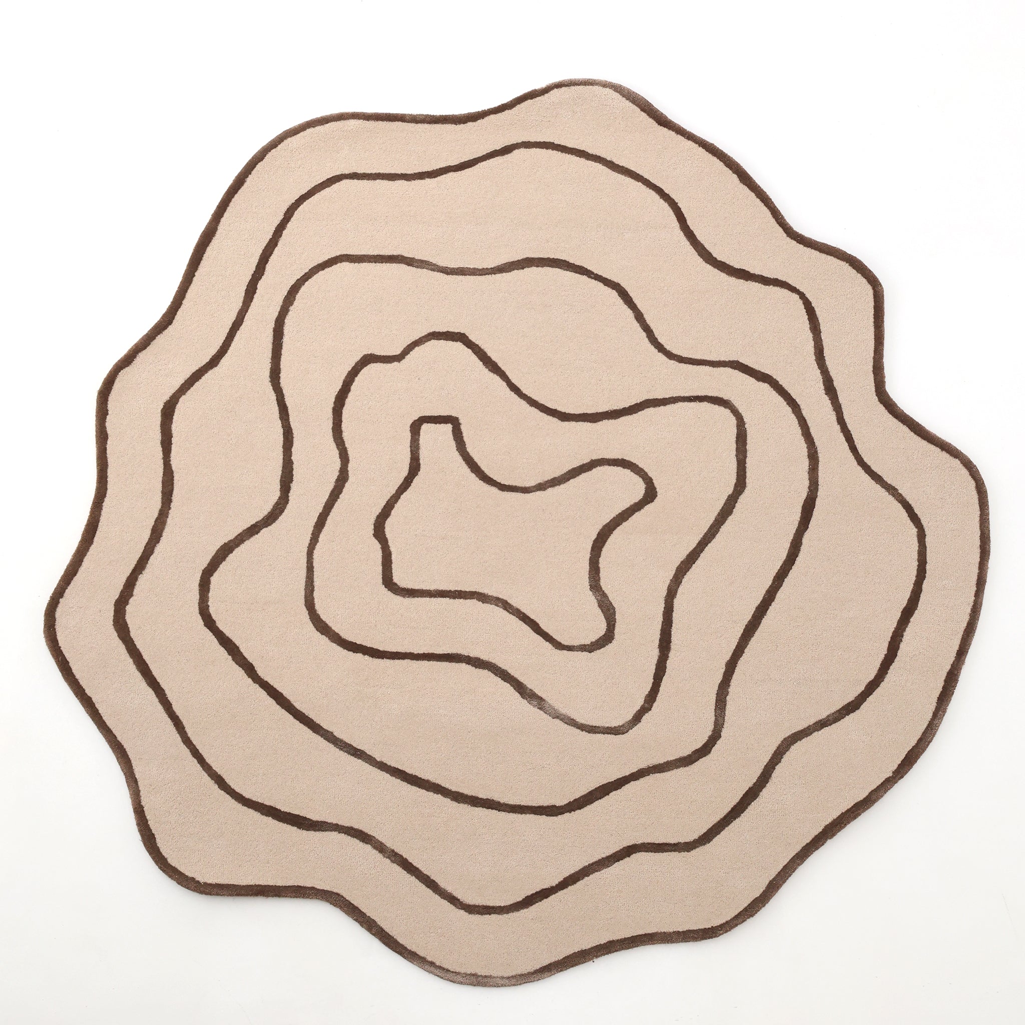The RAMSHA HOME Handmade Multi Color Hand-Tufted Area Rug HTWV-65 features wavy, topographic-inspired dark brown lines on a cream base, adding modern style. Shown on a white background, its irregular shape stands out.