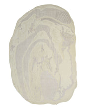 The RAMSHA HOME Abstract Beige Handcrafted Rug – Neutral Textured Modern Area Rug (HTWV 205) features an abstract, irregularly shaped design with layered wavy patterns that evoke the look of natural stone or wood grain in soft beige and light taupe tones.