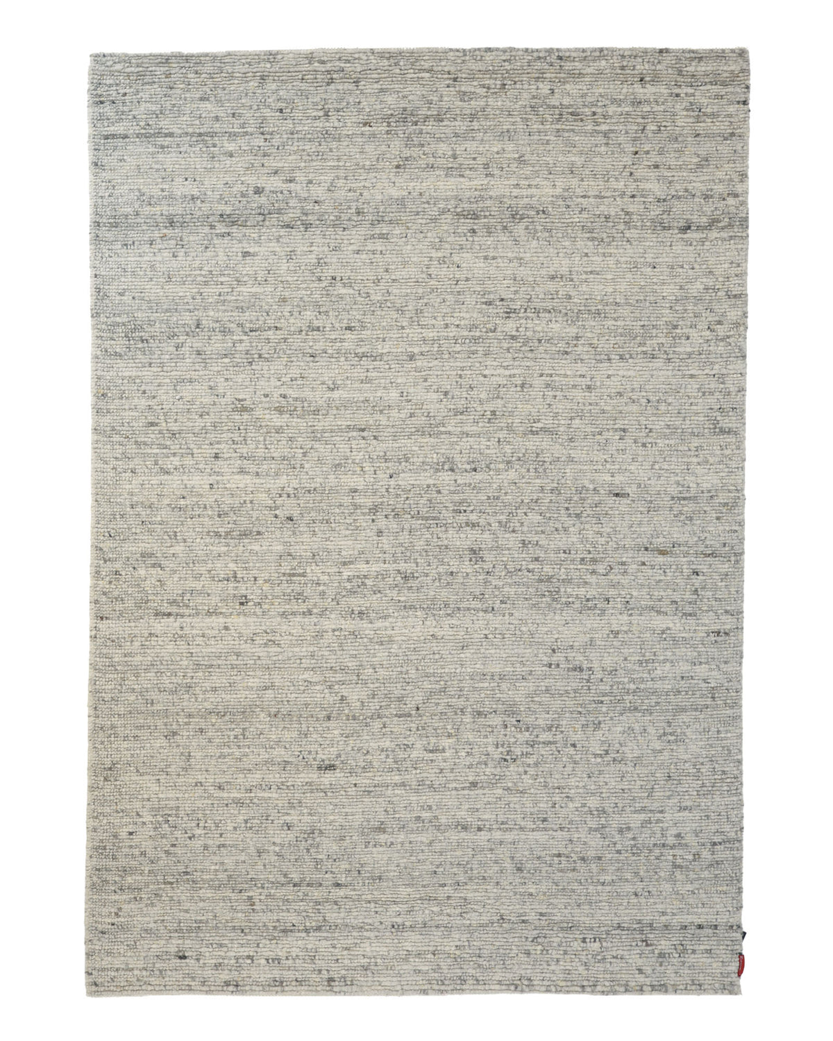 Soft Terra Flatweave Wool Rug- SRN-043 by RAMSHA HOME is a rectangular, light gray area rug crafted with traditional techniques. Featuring a simple and minimalist design with a subtle, slightly mottled texture, this neutral color rug is accented by a small red tag in one corner.