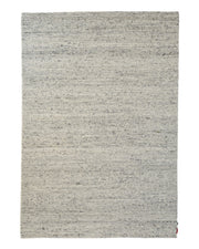 Soft Terra Flatweave Wool Rug- SRN-043 by RAMSHA HOME is a rectangular, light gray area rug crafted with traditional techniques. Featuring a simple and minimalist design with a subtle, slightly mottled texture, this neutral color rug is accented by a small red tag in one corner.