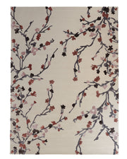 Introducing the Multi Color Handmade Area Rug HTWV-119 by RAMSHA HOME—a beige wool rug adorned with an abstract floral pattern depicting branches and blossoms in hues of brown, pink, and deep purple that sweep diagonally across its surface. This hand-tufted carpet effortlessly adds a touch of elegance reminiscent of a cherry blossom area rug to any space.