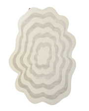 The RAMSHA HOME Beige & Cream Wavy Handmade Area Rug – HTWV-144 features an abstract, hand-tufted design with irregular, wavy concentric shapes in soft cream and beige tones. Its organic, layered pattern and uneven edge give this modern rug a neutral, minimalist aesthetic.