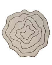 The Handmade Multi Color Hand-Tufted Area Rug HTWV-65 by RAMSHA HOME features an irregular cream shape with wavy brown lines inspired by topographic contours, bringing a unique, artistic flair to any room.
