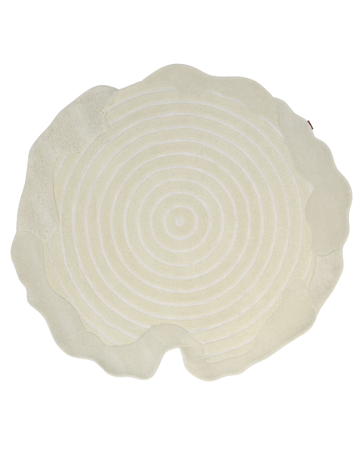 The RAMSHA HOME Natural White Color Handmade Area Rug - HTWV-138 (183 x 200 cm) features a unique, irregular round shape with wavy edges and concentric ring patterns reminiscent of a tree stump cross-section. Hand tufted in a cream hue, this distinctive rug brings nature-inspired charm to any space.