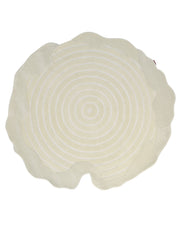 The RAMSHA HOME Natural White Color Handmade Area Rug - HTWV-138 (183 x 200 cm) features a unique, irregular round shape with wavy edges and concentric ring patterns reminiscent of a tree stump cross-section. Hand tufted in a cream hue, this distinctive rug brings nature-inspired charm to any space.
