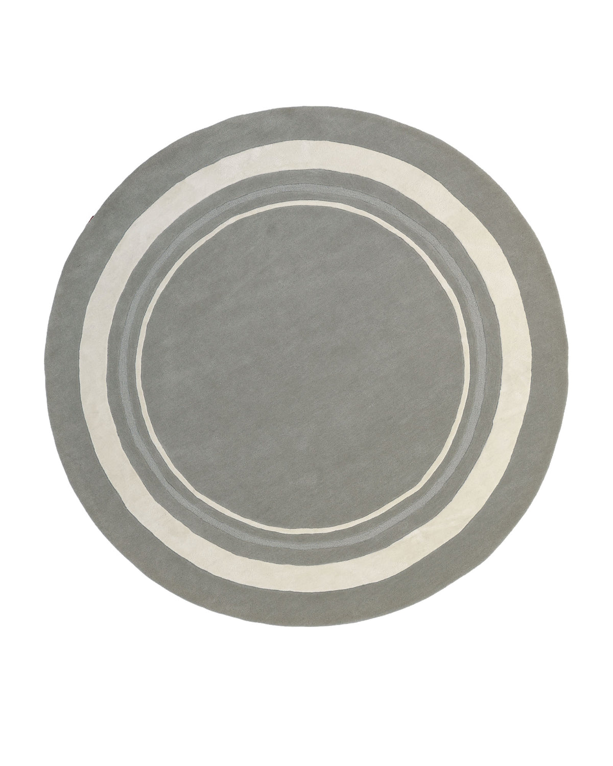 The RAMSHA HOME Grey & White Color Round Handmade Rug - HTWV-121 is an elegant handtufted wool rug featuring three concentric rings in white and light gray near the edge, set against a white background. Expertly crafted, this round grey and white rug offers both style and comfort to any space.
