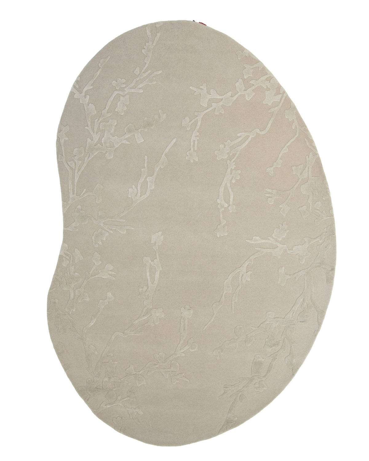 The RAMSHA HOME Decorative Handmade Area Rug HTWV-118 features a beige color with an irregular shape and embossed floral and branch patterns, evoking delicate blossoms and tree limbs.