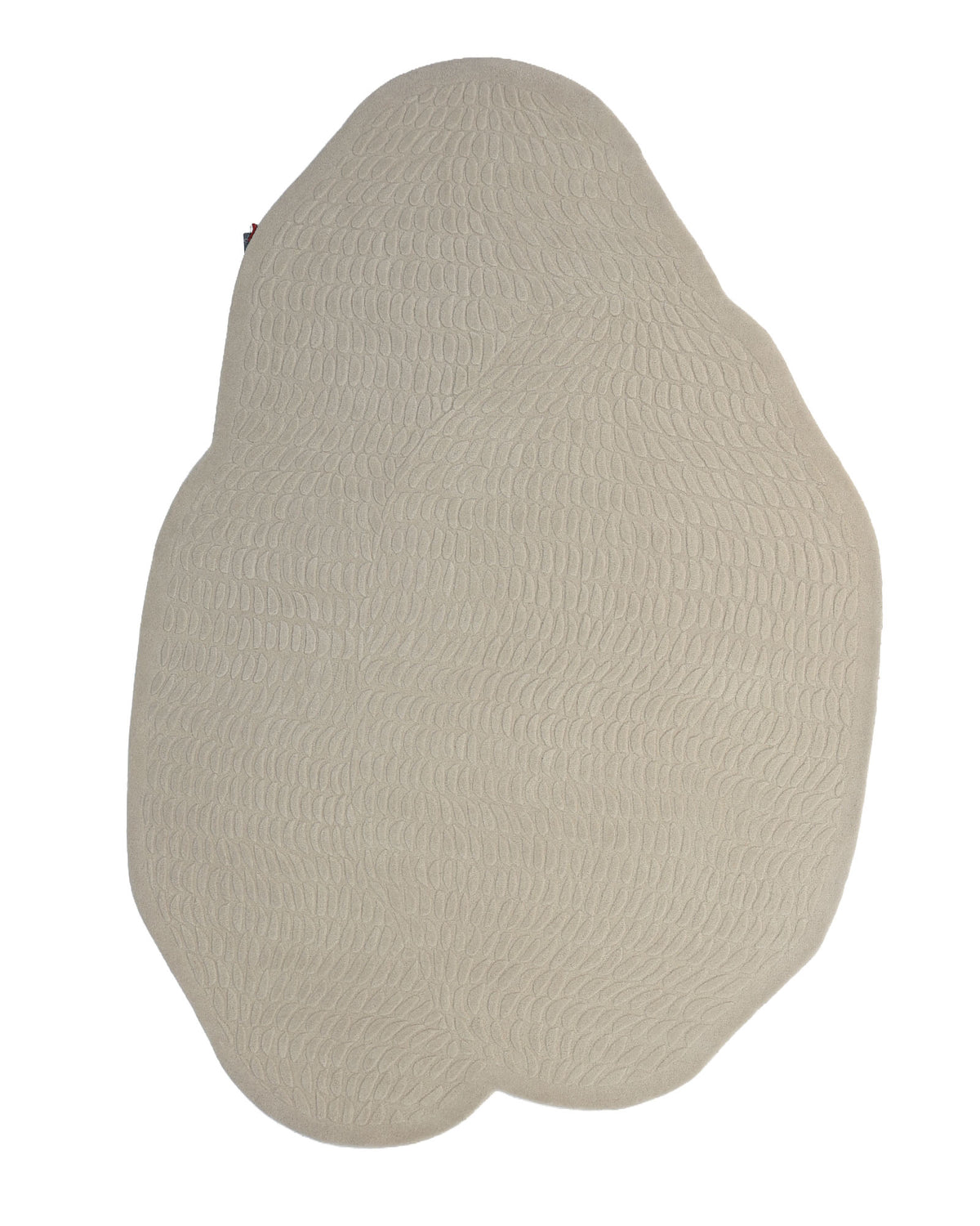 The RAMSHA HOME Beige Color Shape Handmade Rug HTW 104 features an irregular shape and a beige hue, with a textured, scale-like pattern across its surface. This modern rug is displayed against a white background.