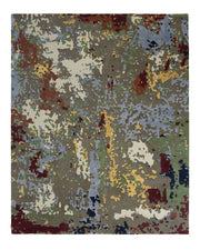 Introducing the RAMSHA HOME Modern Artistic Handmade Rug 240x300 cm (ZUA-21), showcasing an abstract contemporary design with irregular blotches in brown, gray, blue, yellow, green, white, and maroon that create a striking camouflage or paint-splatter effect across its surface.