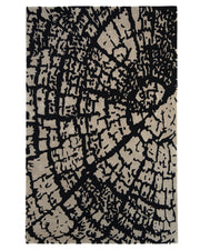 Introduce modern artistry to your space with the Abstract Crackle Black & Ivory Rug – HTWV-33 by RAMSHA HOME. This rectangular hand-tufted rug features a beige background accented with bold, irregular black lines and shapes that evoke the look of a tree trunk’s cross-section or a cracked surface, creating an abstract, organic pattern in striking black and white.
