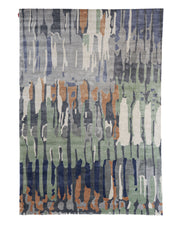 The RAMSHA HOME Decorative Area Carpet Tencil & Cotton Multi Color HKV-09 features an abstract hand-knotted design with vertical brushstroke patterns in shades of blue, green, gray, beige, and rust for a modern, artistic touch.