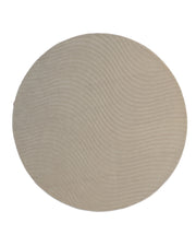 The RAMSHA HOME Home Decor Handmade Area Rug - HTW 96 features a round, beige wool construction adorned with subtle wavy line patterns across its surface, offering a textured and elegant look against a plain white background.